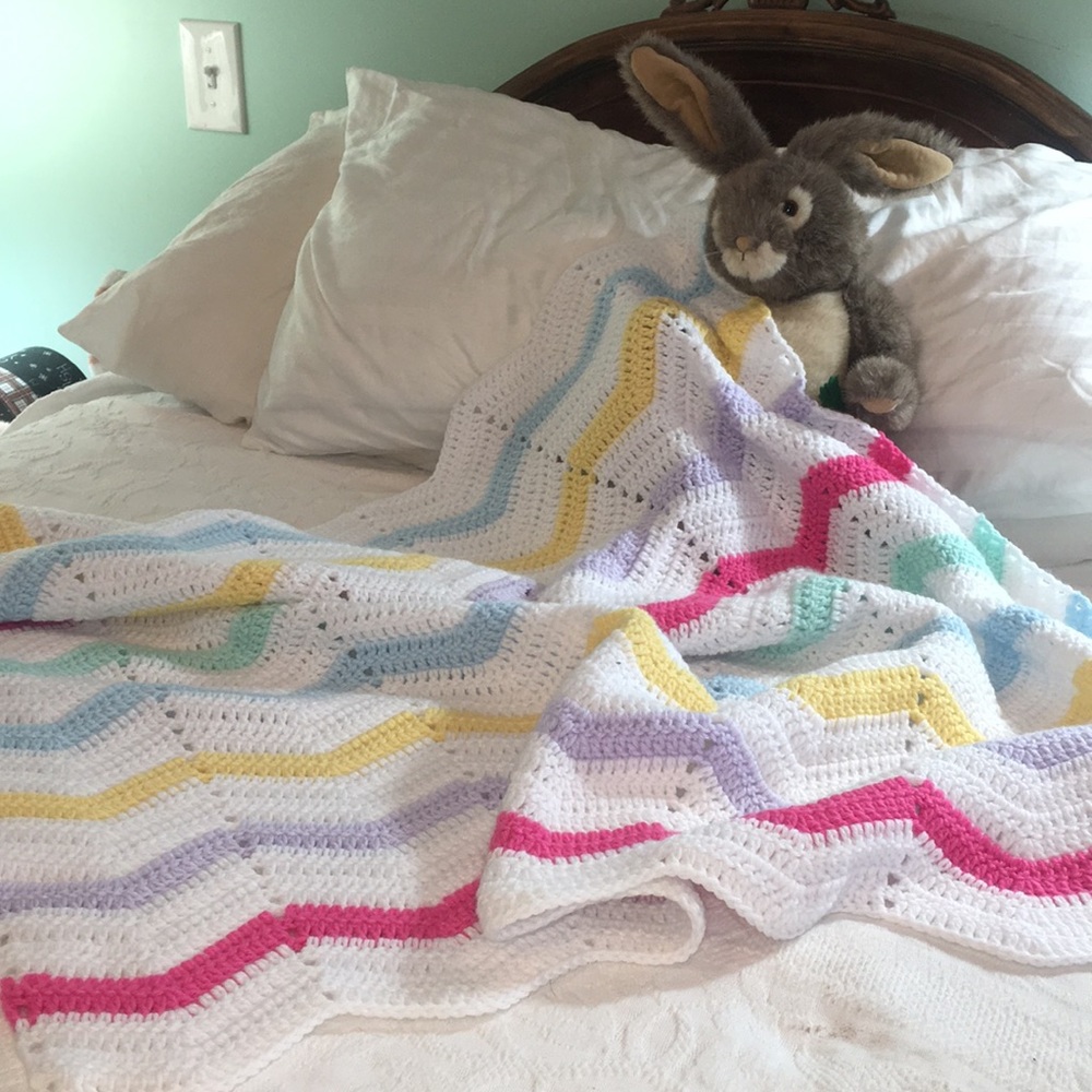 Vintage baby Afghan crocheted brights with white.